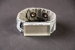 Grey leather cuff with glass rectangle stone